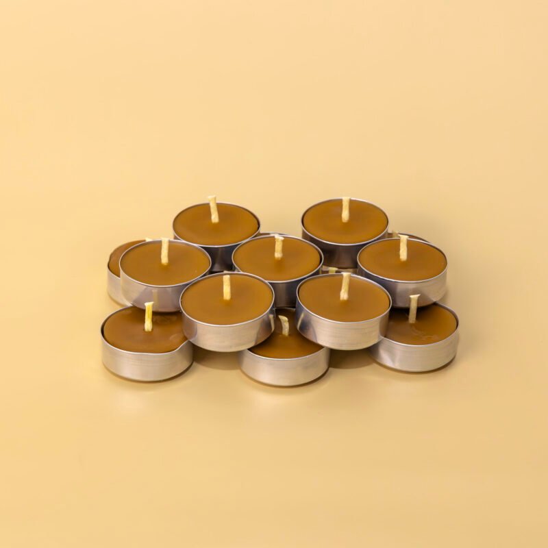 Inicio Pack de velas de té de cera de abeja naranja en cápsulas metálicas